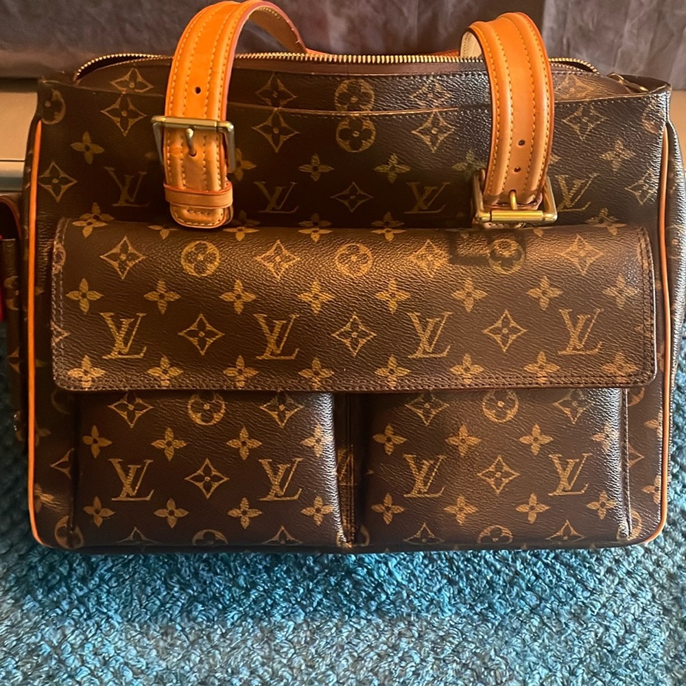 Louis Vuitton Multiplicite / Serial: MB1004